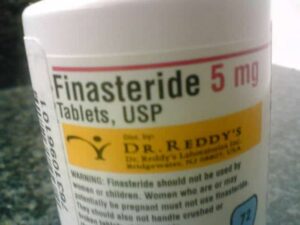 Finasteride, marketed as Propecia, has the side effect of erectile dysfunction.