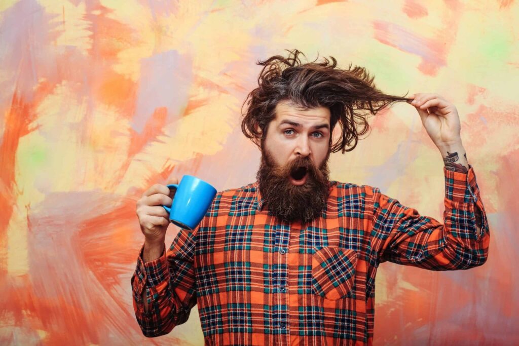 The man bun, as well as its relative, the man bun fade, have experienced an uptick in popularity in recent years.
