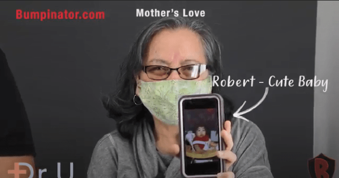 AKN patient's mother proudly shows a picture of what he looked like as a toddler