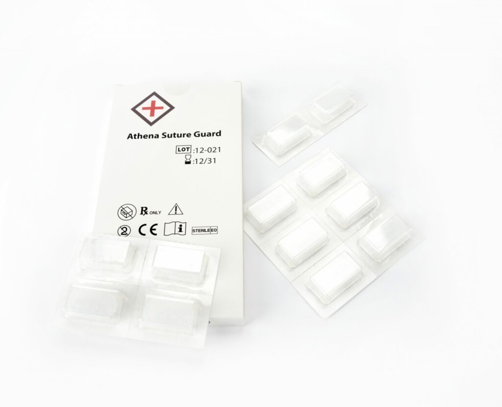 Athena Suture Kit™ device, a patented surgical tool designed by Dr. Umar to support gradual wound closure with minimal skin trauma.
